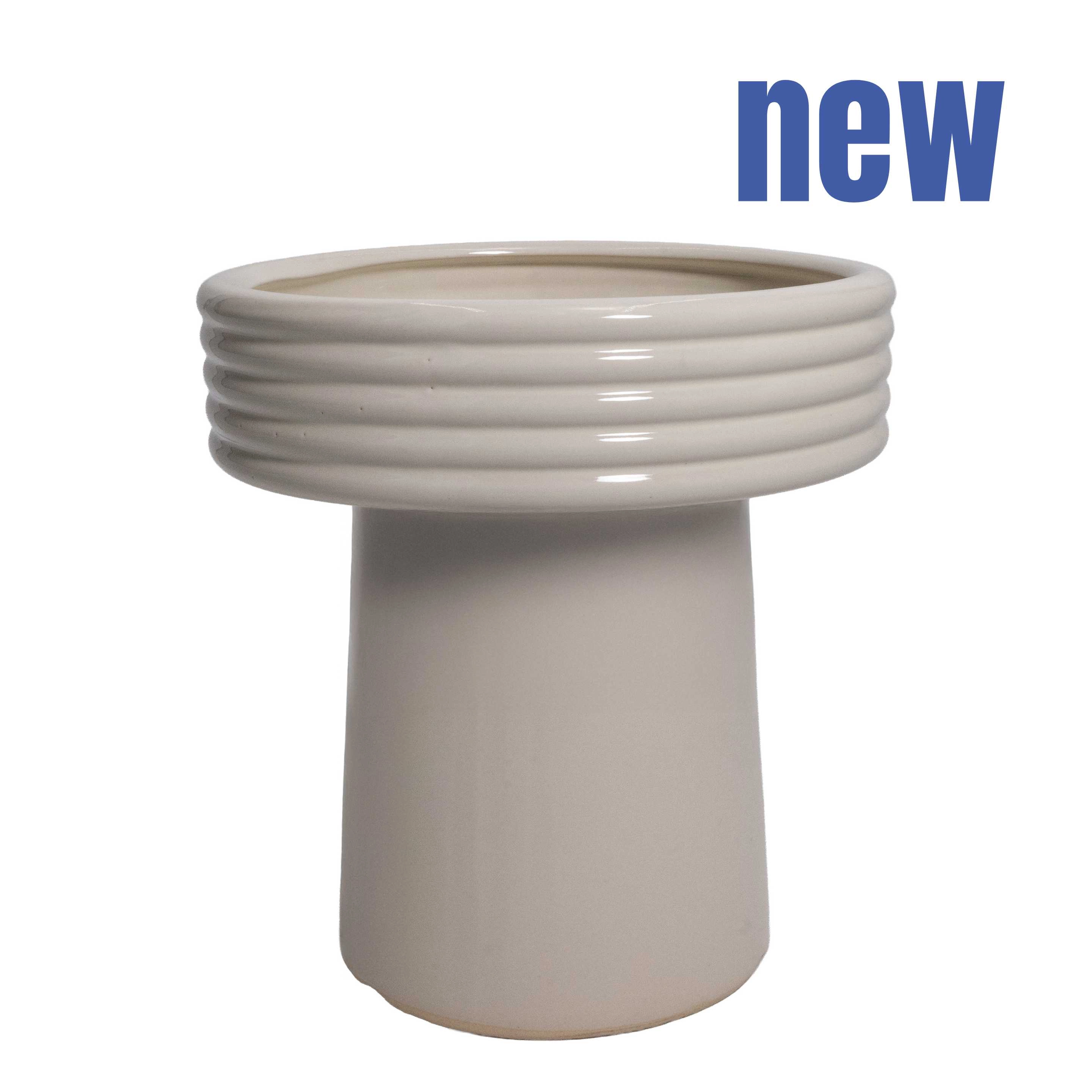 Ceramic pot on leg