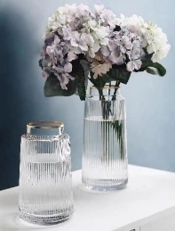 Glass vase ribbed with golden trim